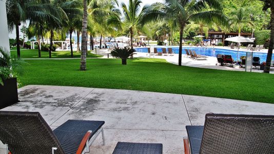 Deck-pool-view-Villa-Magna-ground-floor-condominium-beach-front-nuevo-vallarta