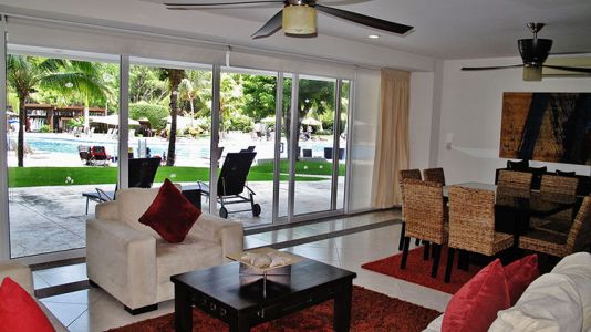 Living area beach pool Villa-Magna ground floor condominium beach front Nuevo Vallarta